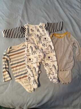 Baby 6-9 month bundle. Cute Animal onsie +2 t shirts